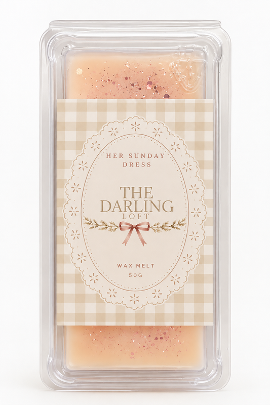 Her Sunday Dress soy wax melts in packaging by The Darling Loft, featuring a pastel design and gold accents.